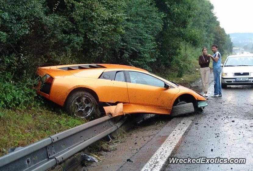Driver Lost Control in The Rain, Spun Out And Ended up on The Guardrail...